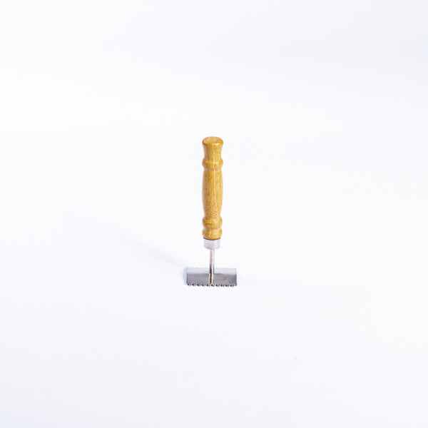 Nettoyeur de grille à reine en métal