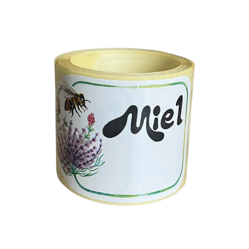 Étiquette "miel 500g" avec fleur et abeille, le rouleau de 100